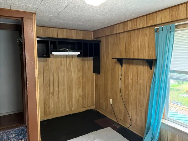 a view of walk in closet with window