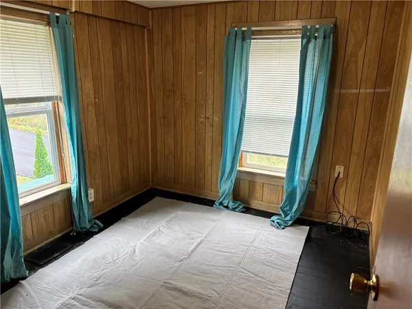 a view of an entryway with a door