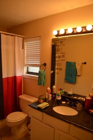 a view of a room with a fan