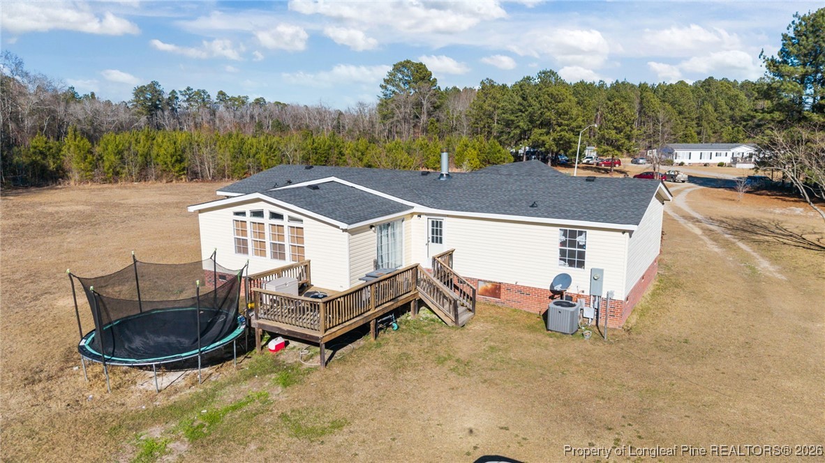 26261 Beaver Run Wagram, NC 28396 - Photo 11 of 50 an aerial view of a house with table and chairs