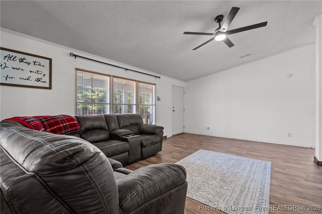 26261 Beaver Run Wagram, NC 28396 - Photo 17 of 50 a living room with furniture and a large window