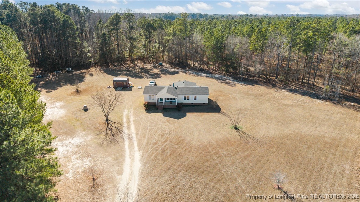 26261 Beaver Run Wagram, NC 28396 - Photo 4 of 50 a view of yard with trees