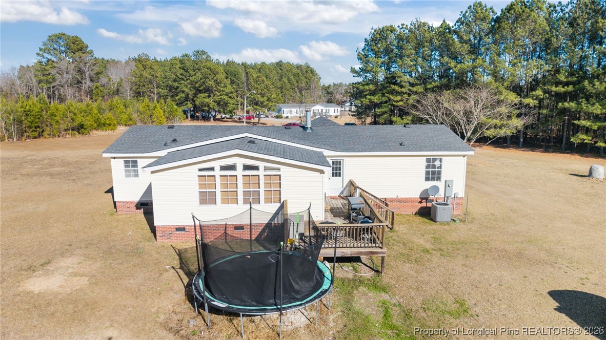 26261 Beaver Run Wagram, NC 28396 - Photo 10 of 50 an aerial view of a house with outdoor space