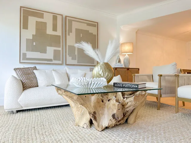 a living room with furniture and a couch