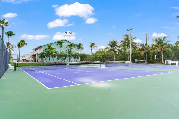 a view of a swimming pool with a yard