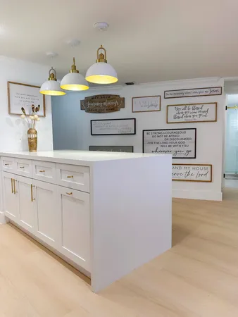 a kitchen with cabinets a sink and a stove