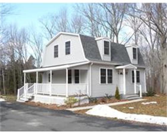 1215 Petersham Road Athol, MA 01331 - Photo 1 of 9 a view of a white house with large windows and palm trees