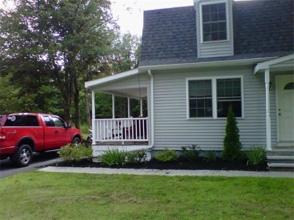 1215 Petersham Road Athol, MA 01331 - Photo 3 of 9 a front view of a house with a garden