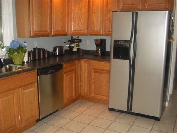 1215 Petersham Road Athol, MA 01331 - Photo 6 of 9 a kitchen with stainless steel appliances a refrigerator and a sink