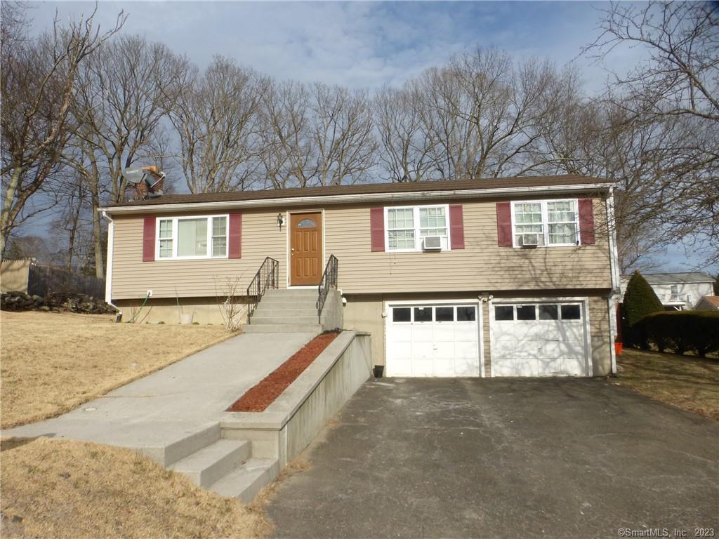 70 Fieldstone Road Waterbury, CT 06704 - Photo 1 of 1 a view of a large white building with a large windows