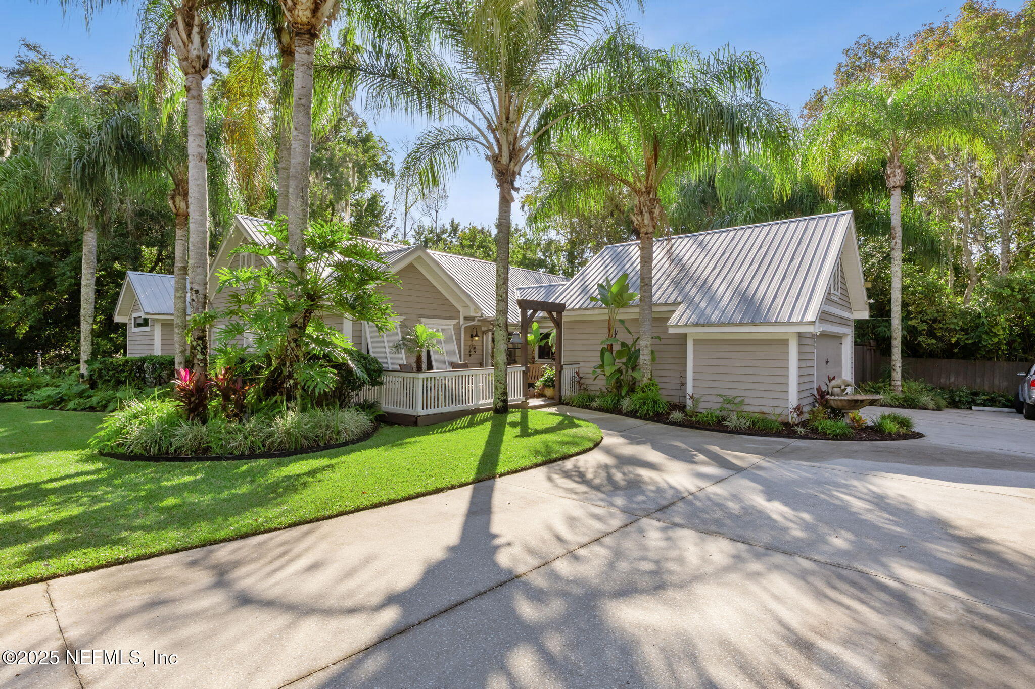 2245 Reed Street Orange Park, FL 32073 - Photo 3 of 107 a view of a house with a yard and tree s