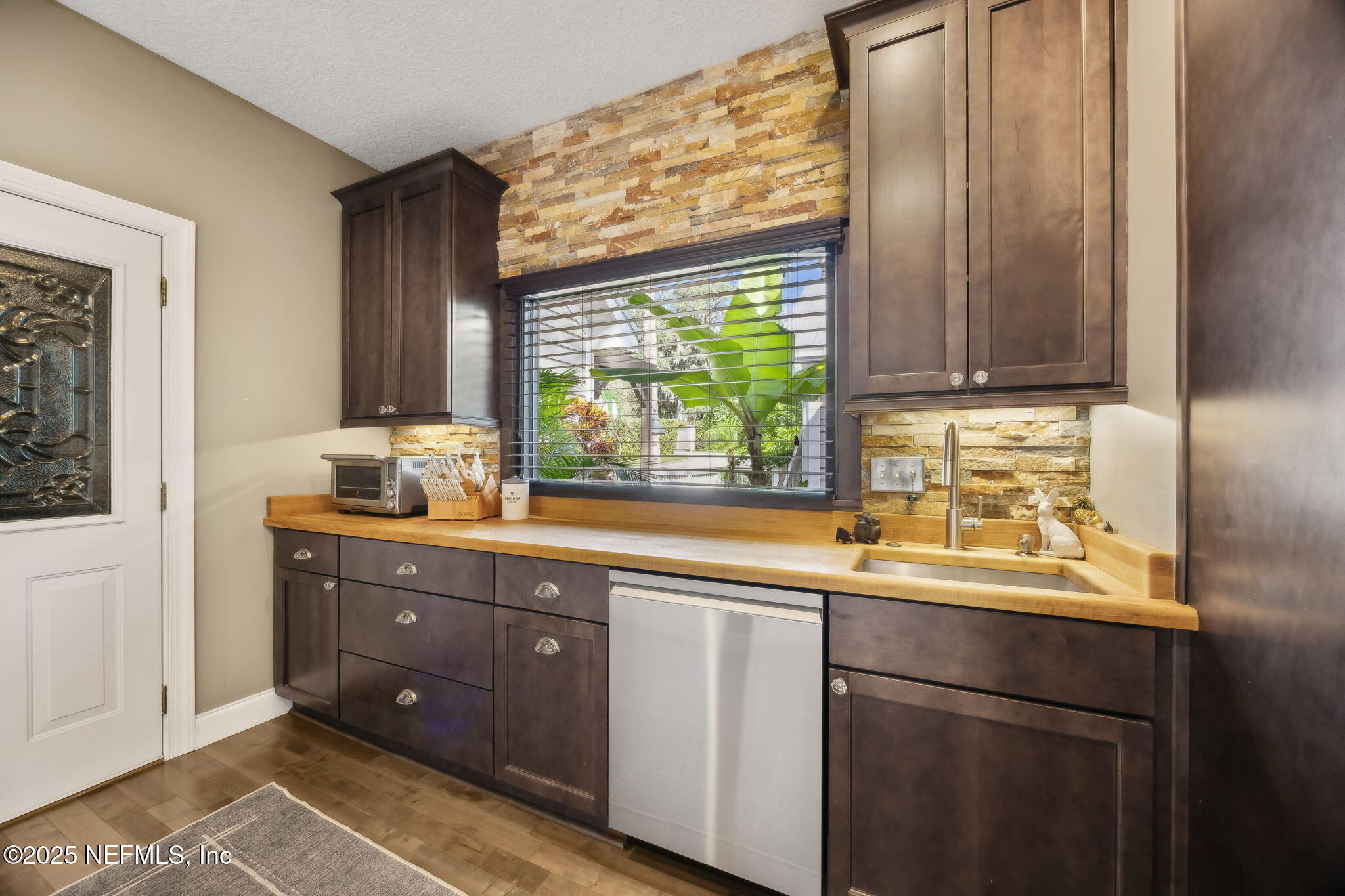 2245 Reed Street Orange Park, FL 32073 - Photo 31 of 107 a kitchen with a sink and a window
