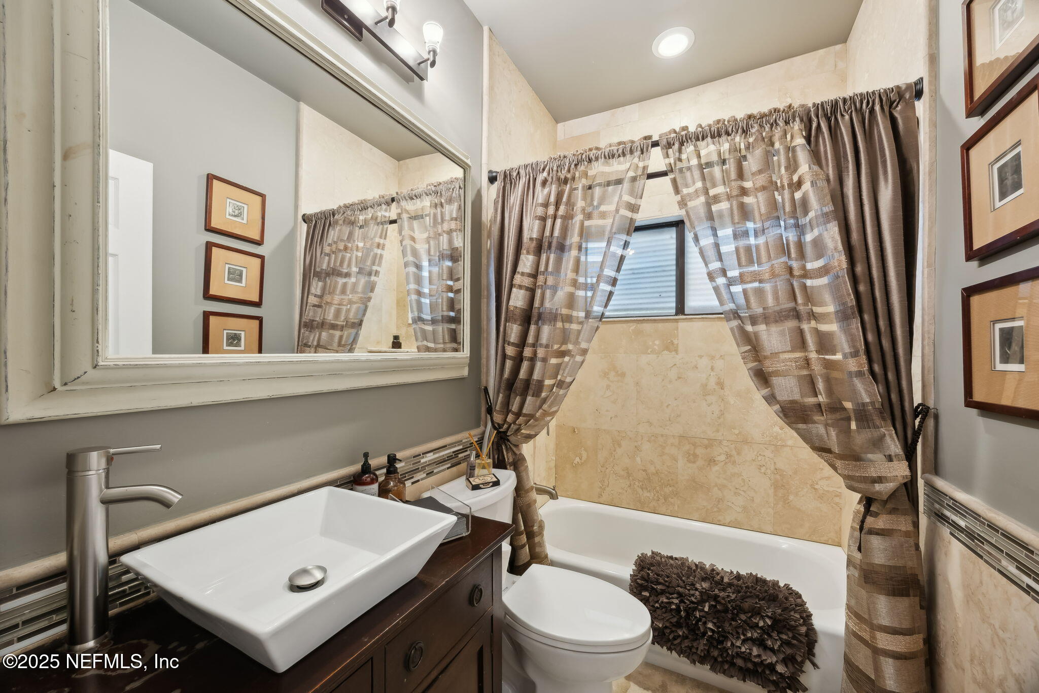 2245 Reed Street Orange Park, FL 32073 - Photo 55 of 107 a bathroom with a sink toilet and shower