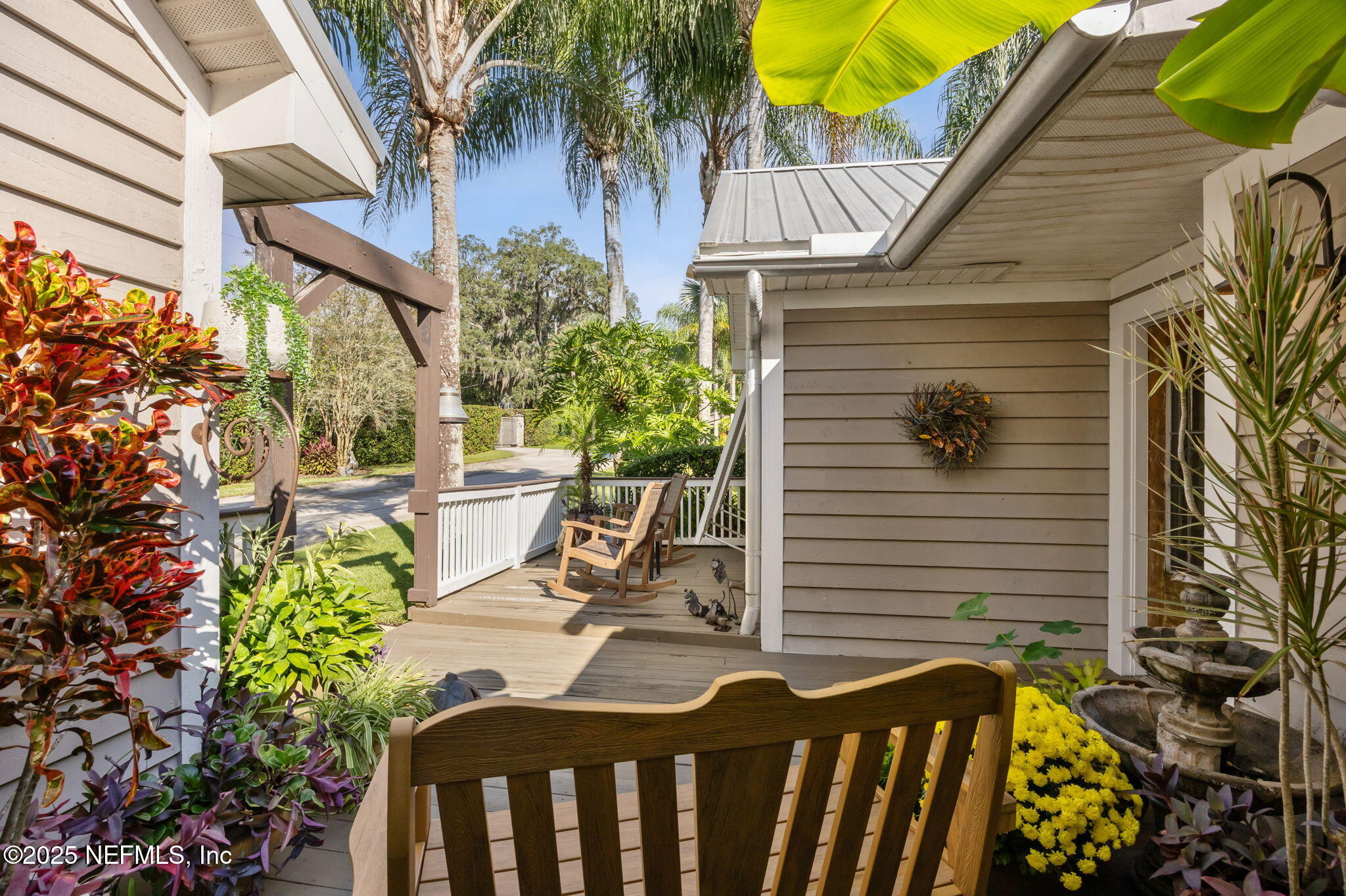 2245 Reed Street Orange Park, FL 32073 - Photo 6 of 107 a view of a chair and table in the balcony