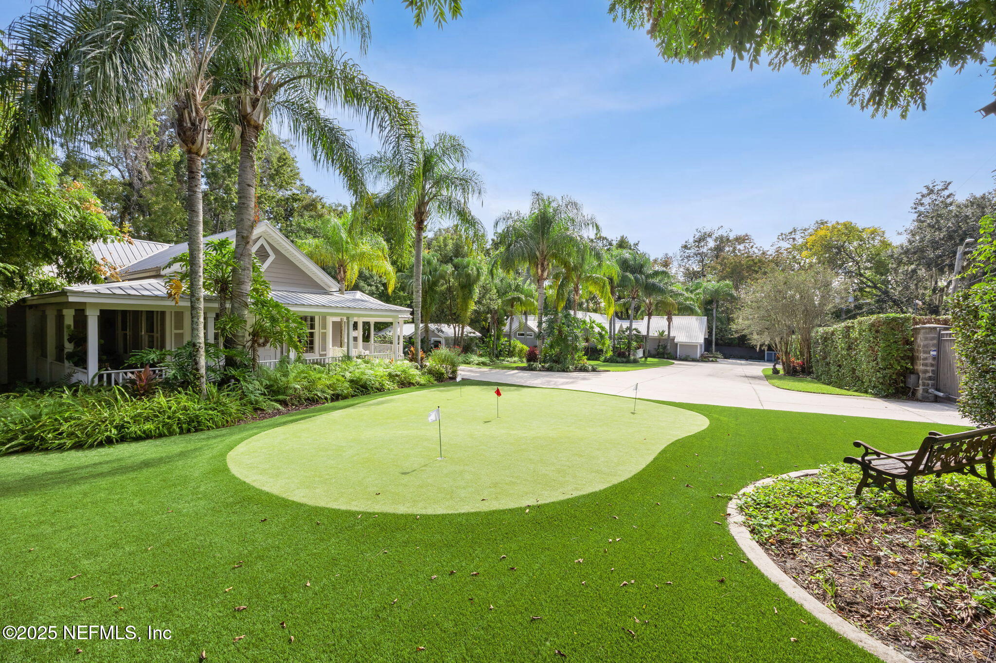 2245 Reed Street Orange Park, FL 32073 - Photo 73 of 107 a view of a swimming pool with a garden