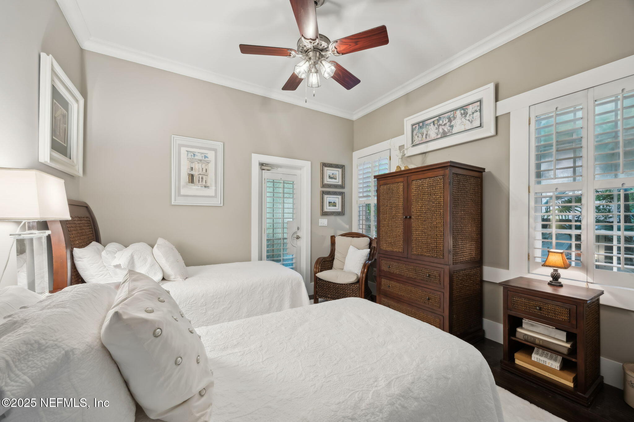 2245 Reed Street Orange Park, FL 32073 - Photo 95 of 107 a bedroom with two beds and a chandelier