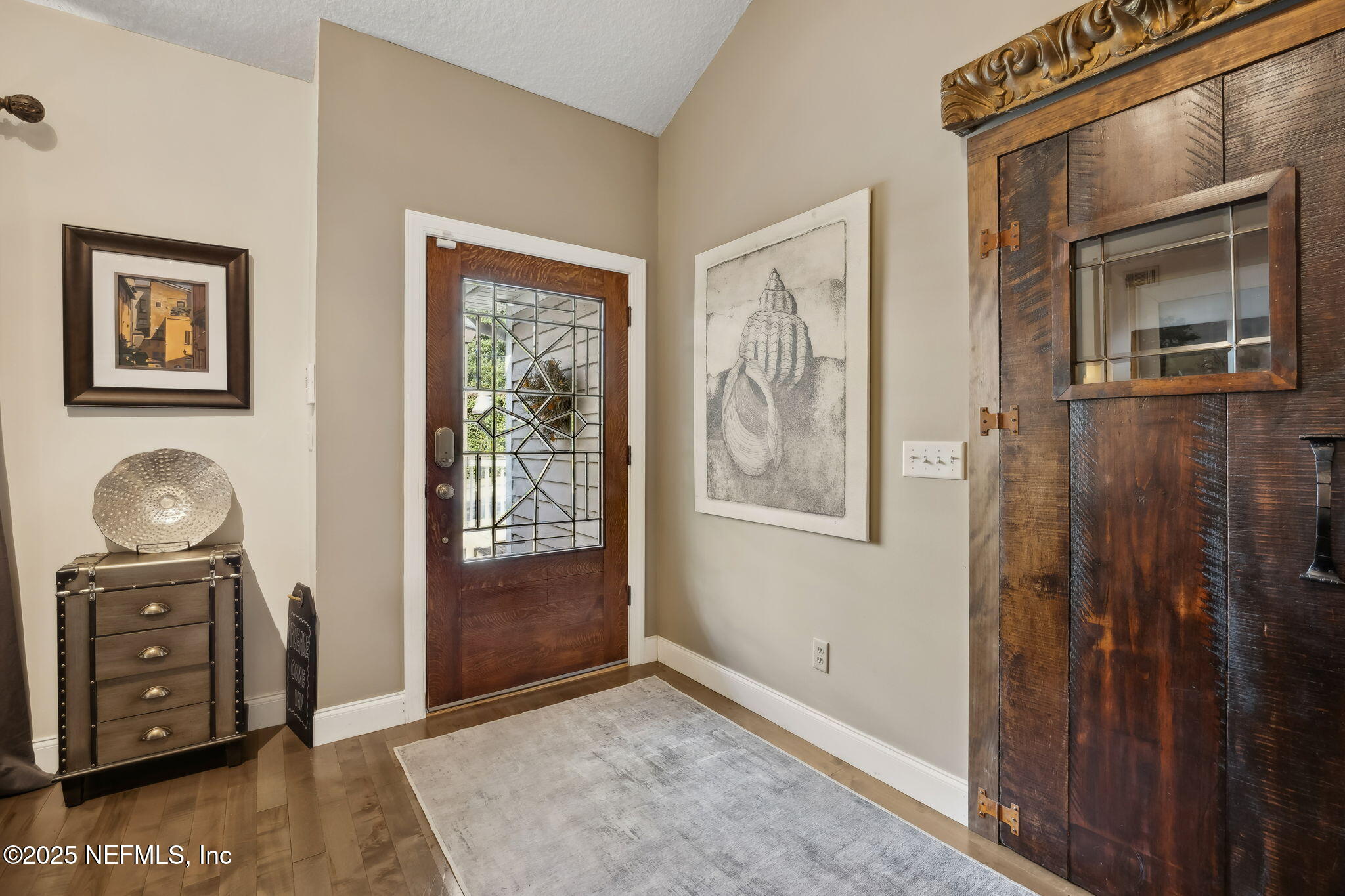 2245 Reed Street Orange Park, FL 32073 - Photo 10 of 107 a view of a hallway with windows and closet