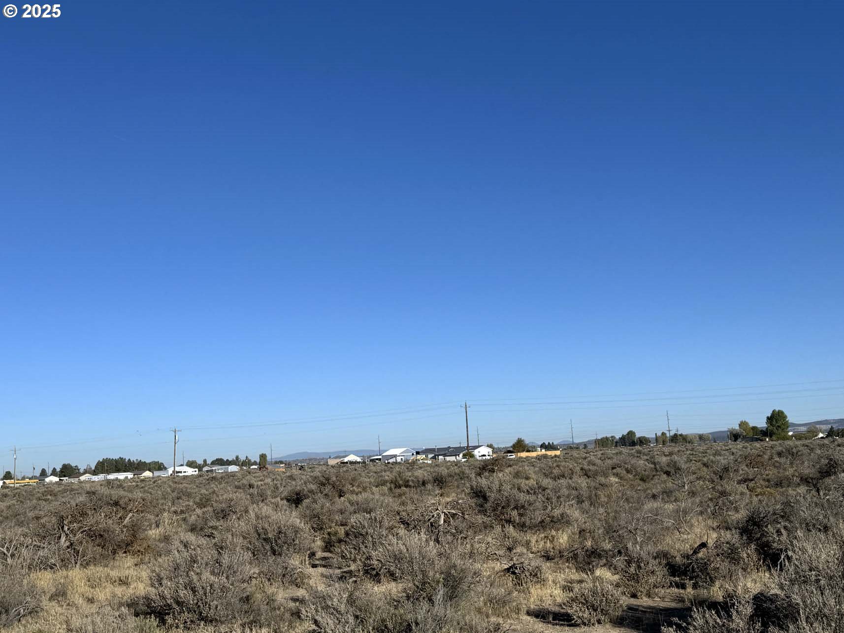Pinion Lane, Unit 9200 Christmas Valley, OR 97641 - Photo 19 of 34 a view of ocean with a beach