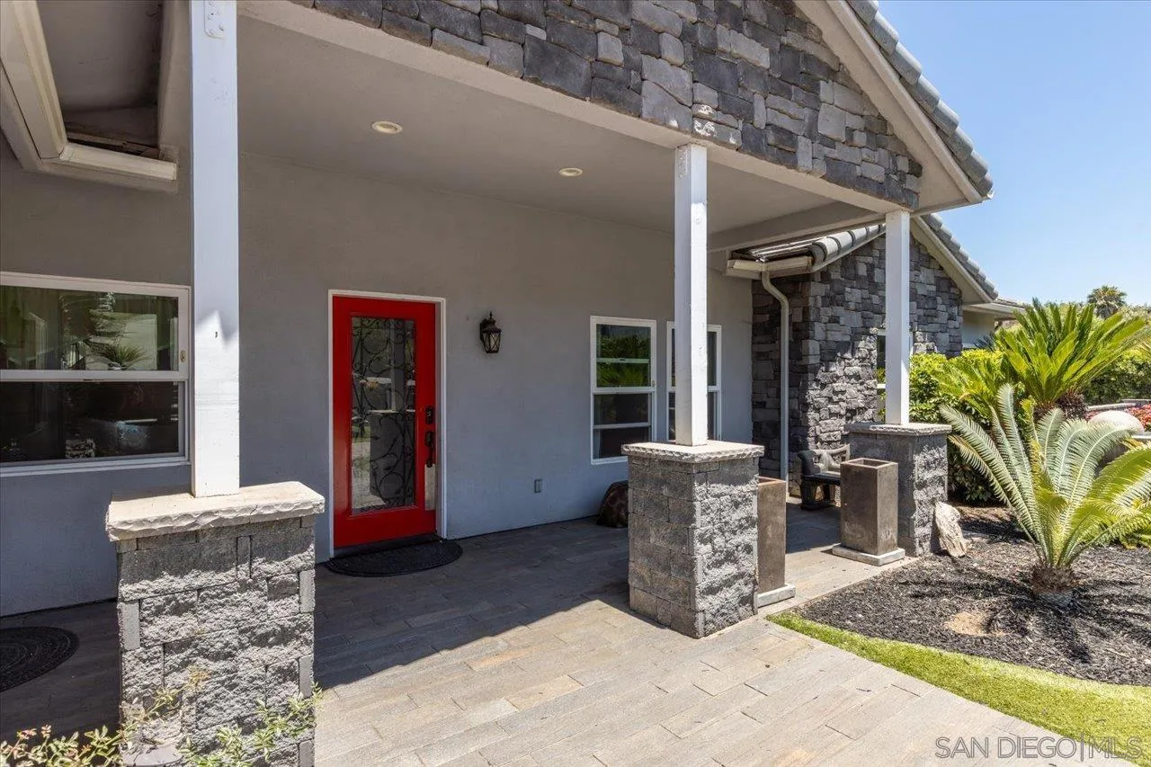 15786 Olde Highway 80 El Cajon, CA 92021 - Photo 13 of 75 a front view of a house with outdoor seating