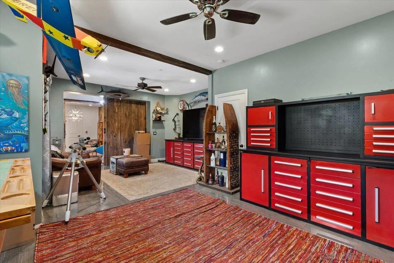15786 Olde Highway 80 El Cajon, CA 92021 - Photo 18 of 75 a view of a livingroom with furniture and a flat screen tv