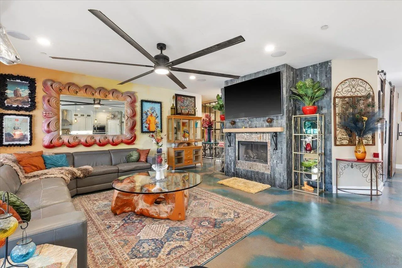 15786 Olde Highway 80 El Cajon, CA 92021 - Photo 26 of 75 a living room with furniture and a fireplace