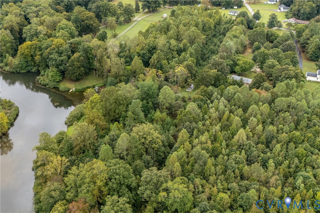 5210 Hopewell Road New Kent, VA 23124 - Photo 12 of 14 an aerial view of residential houses with outdoor space and trees