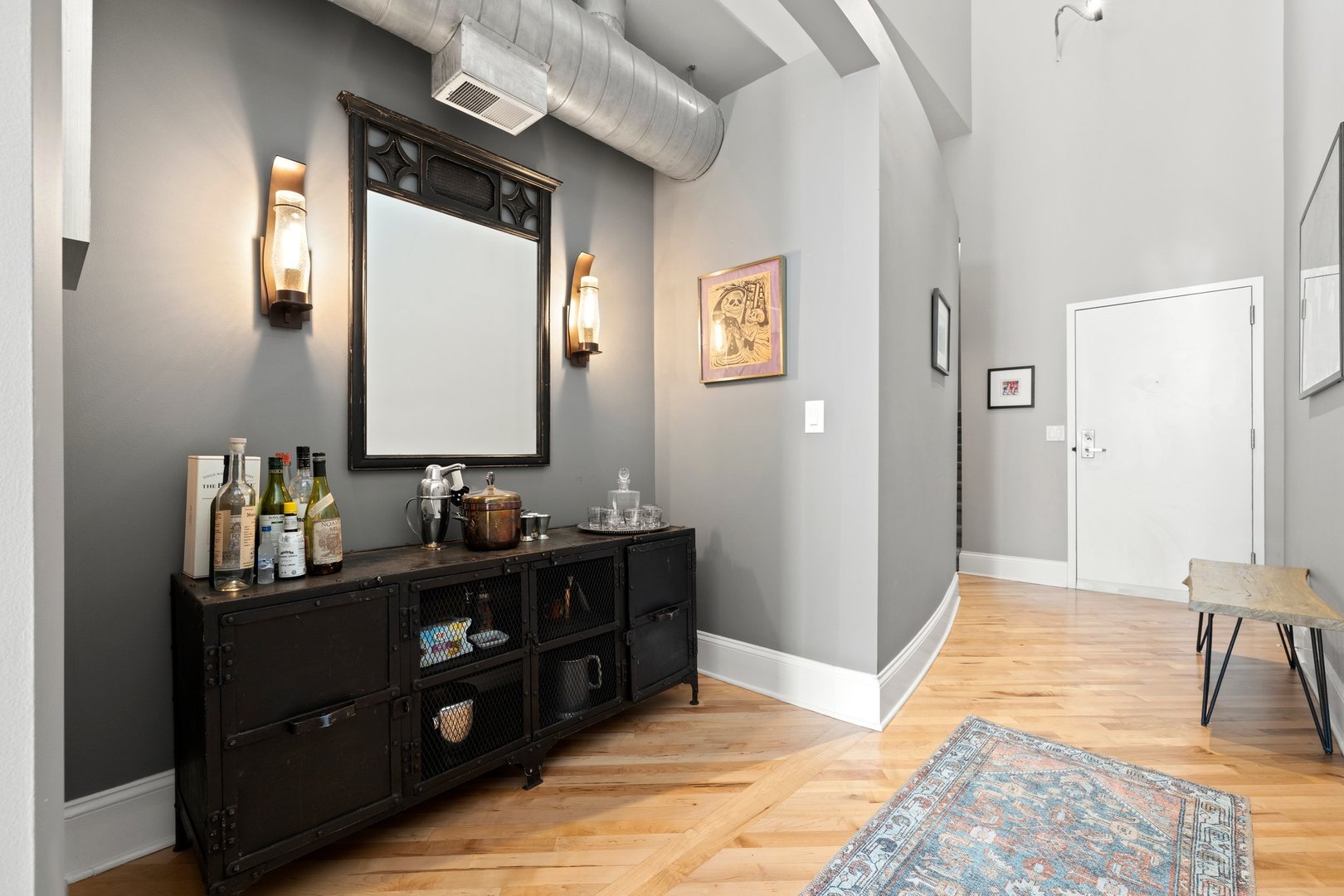 203 South Sangamon Street, Unit 306 Chicago, IL 60607 - Photo 14 of 30 a bathroom with a sink and a mirror