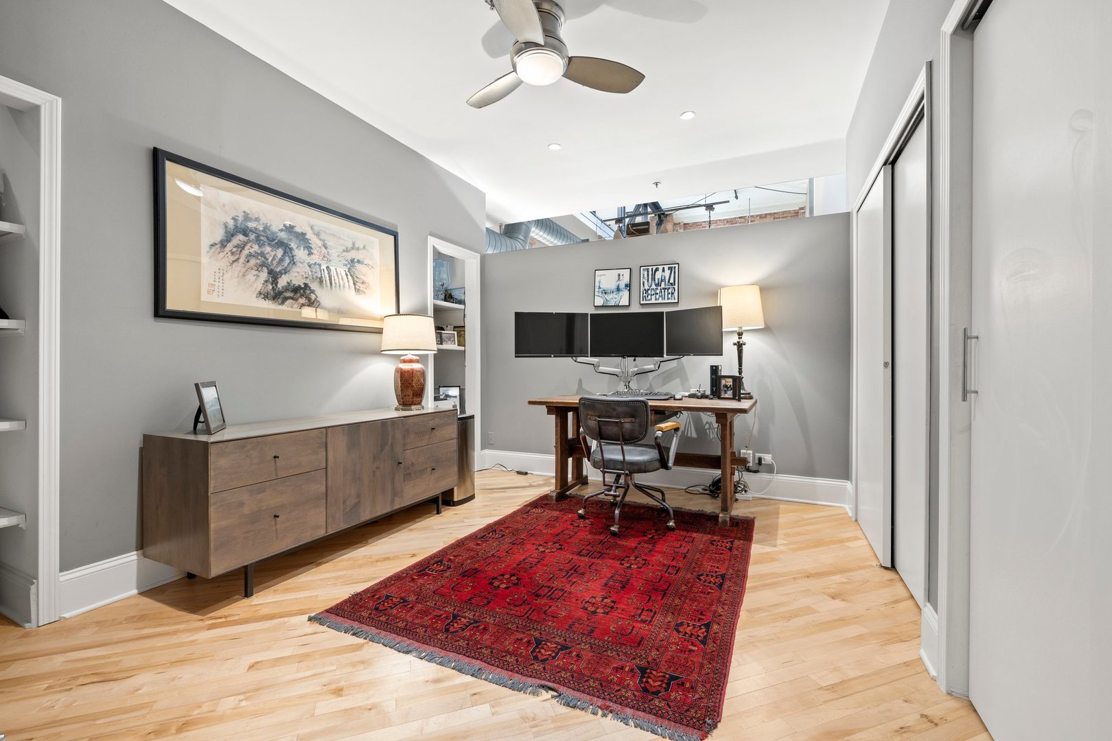 203 South Sangamon Street, Unit 306 Chicago, IL 60607 - Photo 22 of 30 a living room with furniture flat screen tv and a window