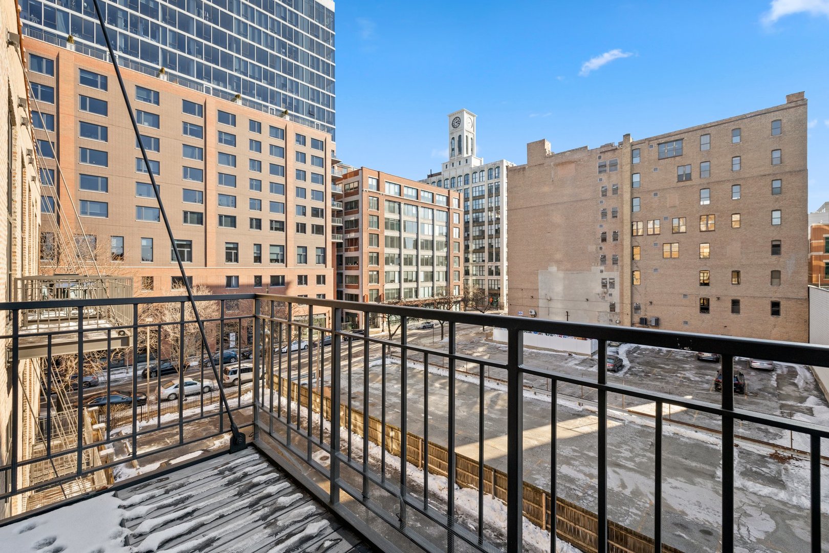 203 South Sangamon Street, Unit 306 Chicago, IL 60607 - Photo 26 of 30 a view of a building from a balcony