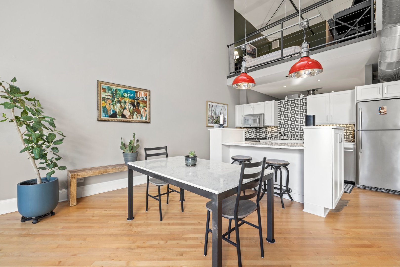 203 South Sangamon Street, Unit 306 Chicago, IL 60607 - Photo 8 of 30 a kitchen with stainless steel appliances granite countertop a refrigerator and a stove top oven