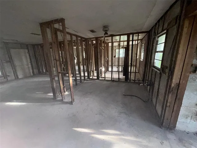 an empty room with windows