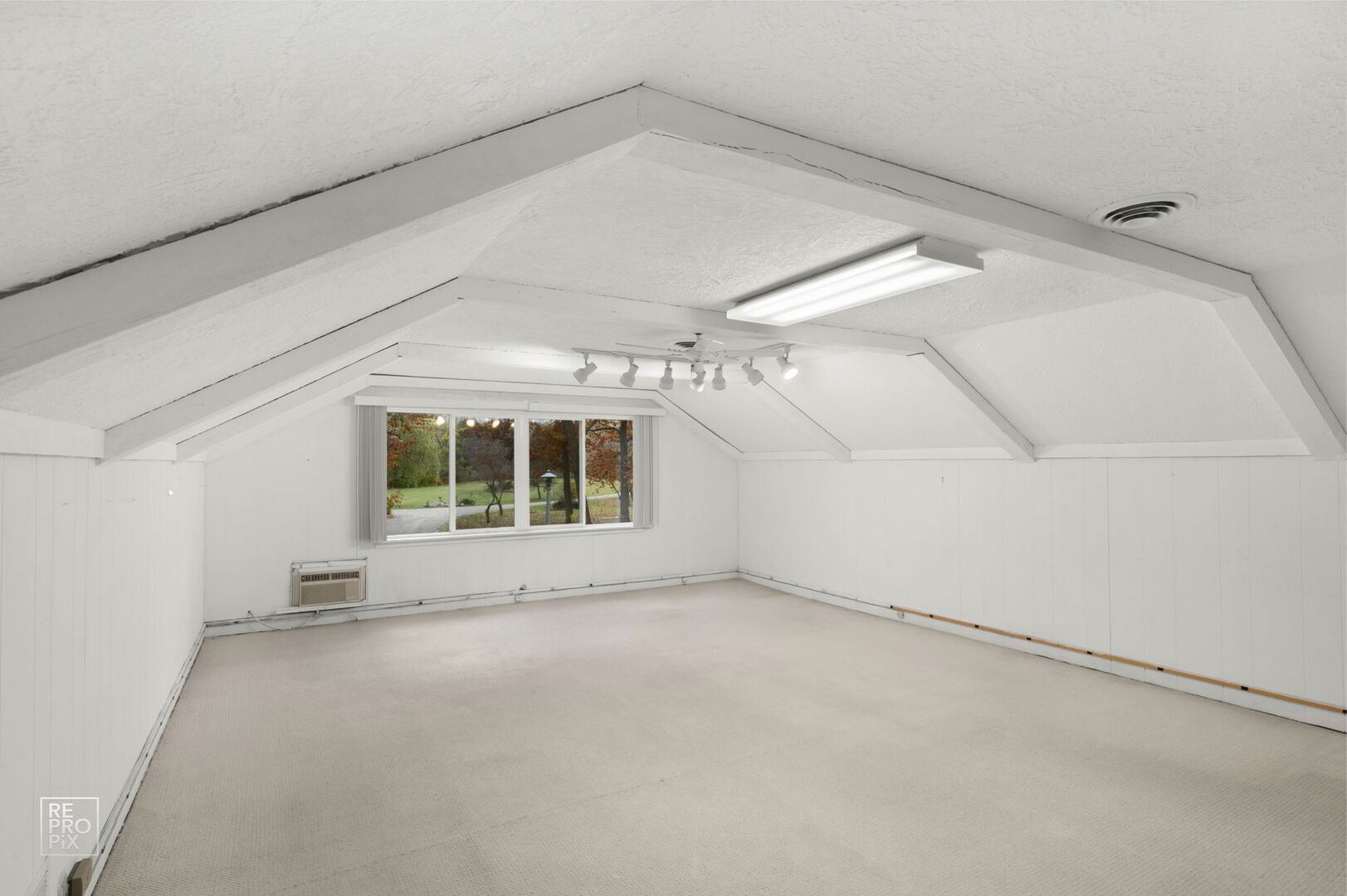 14930 West Wadsworth Road Wadsworth, IL 60083 - Photo 35 of 68 a view of a big room with windows and fireplace