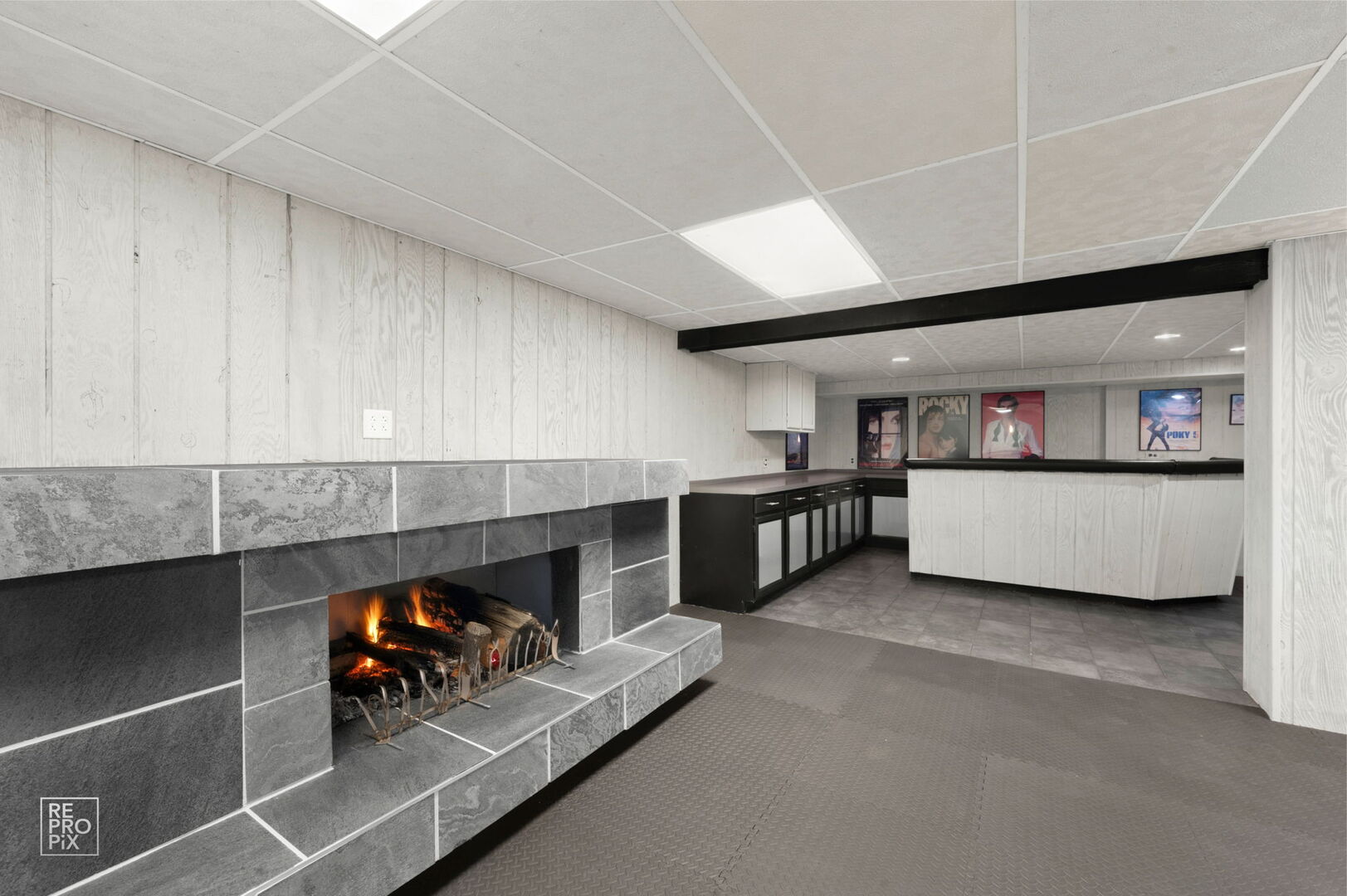 14930 West Wadsworth Road Wadsworth, IL 60083 - Photo 37 of 68 a living room with furniture and a fireplace