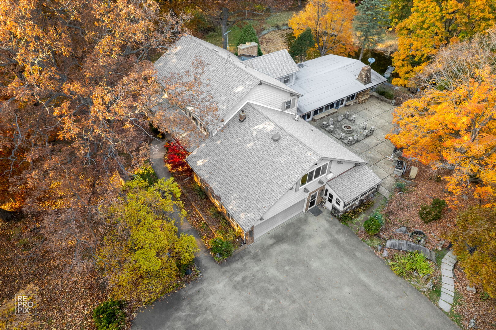 14930 West Wadsworth Road Wadsworth, IL 60083 - Photo 8 of 68 an aerial view of a house with a yard and garden