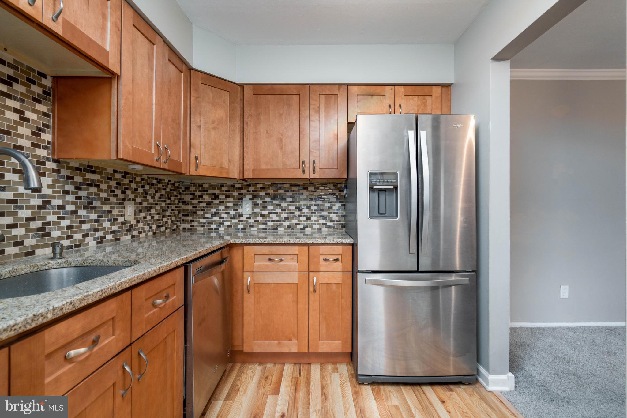 902 Garnet Drive Burlington, NJ 08016 - Photo 1 of 15 a kitchen with granite countertop a refrigerator and a sink