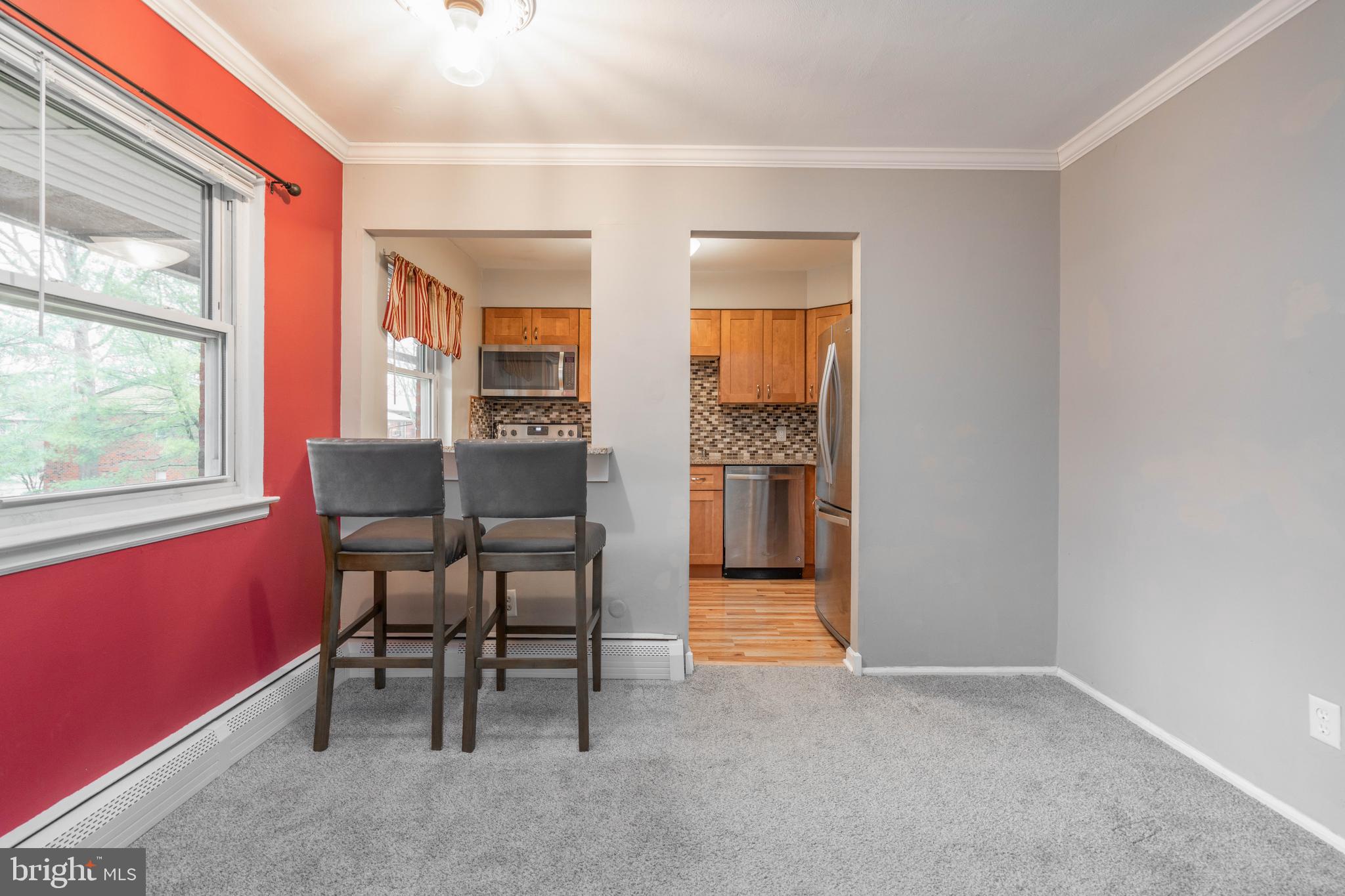 902 Garnet Drive Burlington, NJ 08016 - Photo 5 of 15 a view of a livingroom with furniture and a window