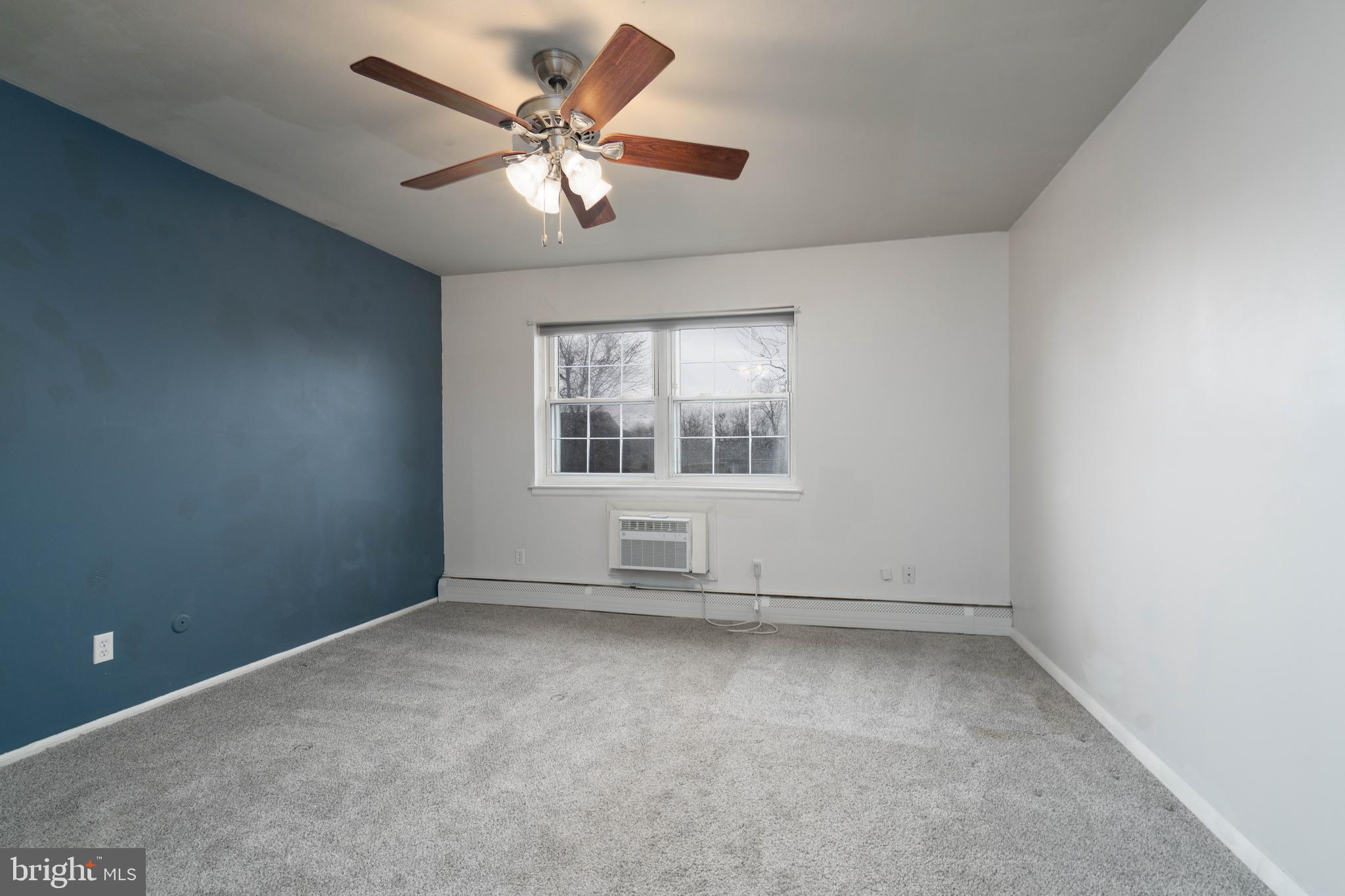 902 Garnet Drive Burlington, NJ 08016 - Photo 10 of 15 an empty room with a window