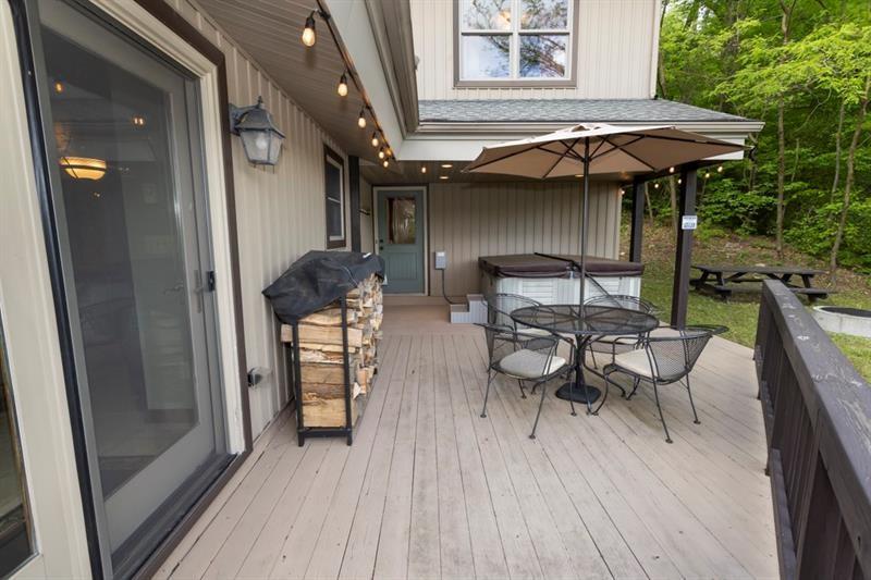 2226 County Line Road Champion, PA 15622 - Photo 13 of 33 an outdoor space with furniture and umbrella