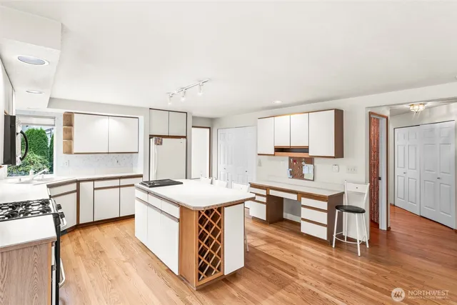 a view of room with projector and screen