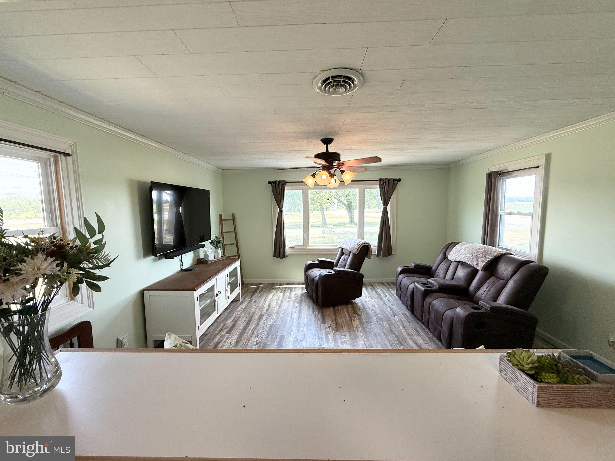 504 Sunset Boulevard Ridgely, MD 21660 - Photo 22 of 29 Cozy living space with scenic views.