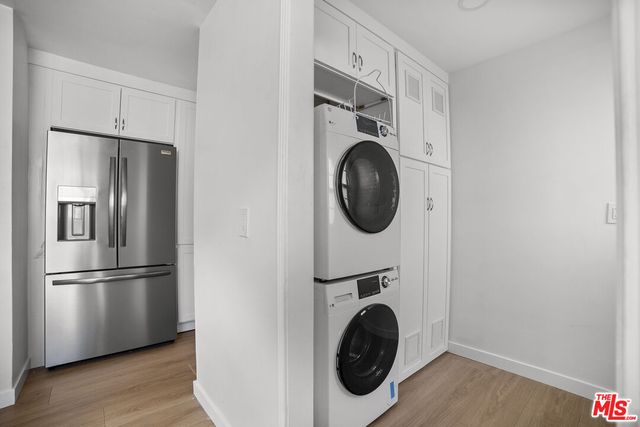 a view of hallway with washer and dryer