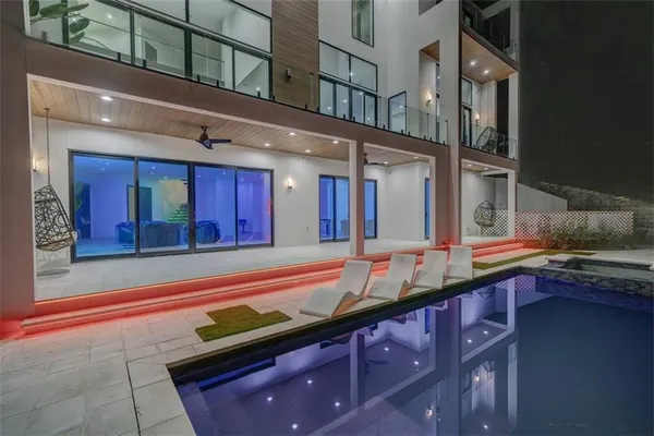 a outdoor space with lots of furniture and garden view