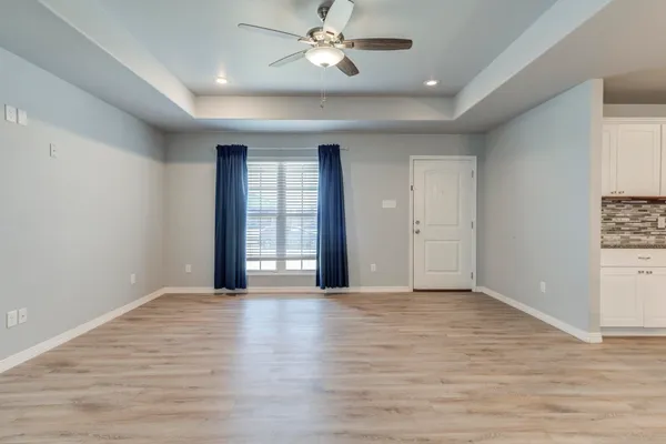 a bathroom with a sink and a large mirror