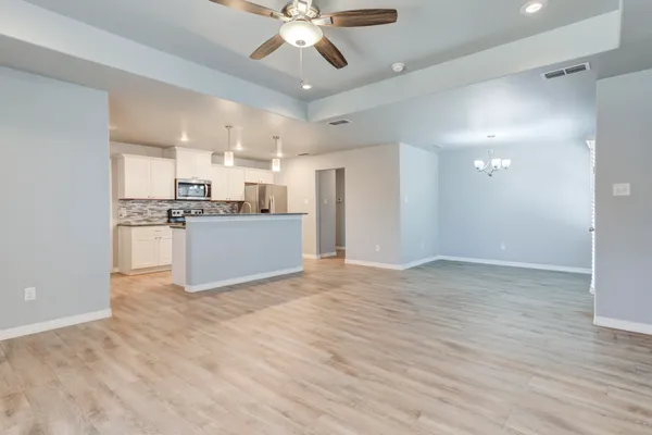 a bathroom with a bathtub and a toilet