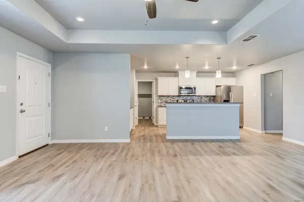 a view of a room with racks on the wall