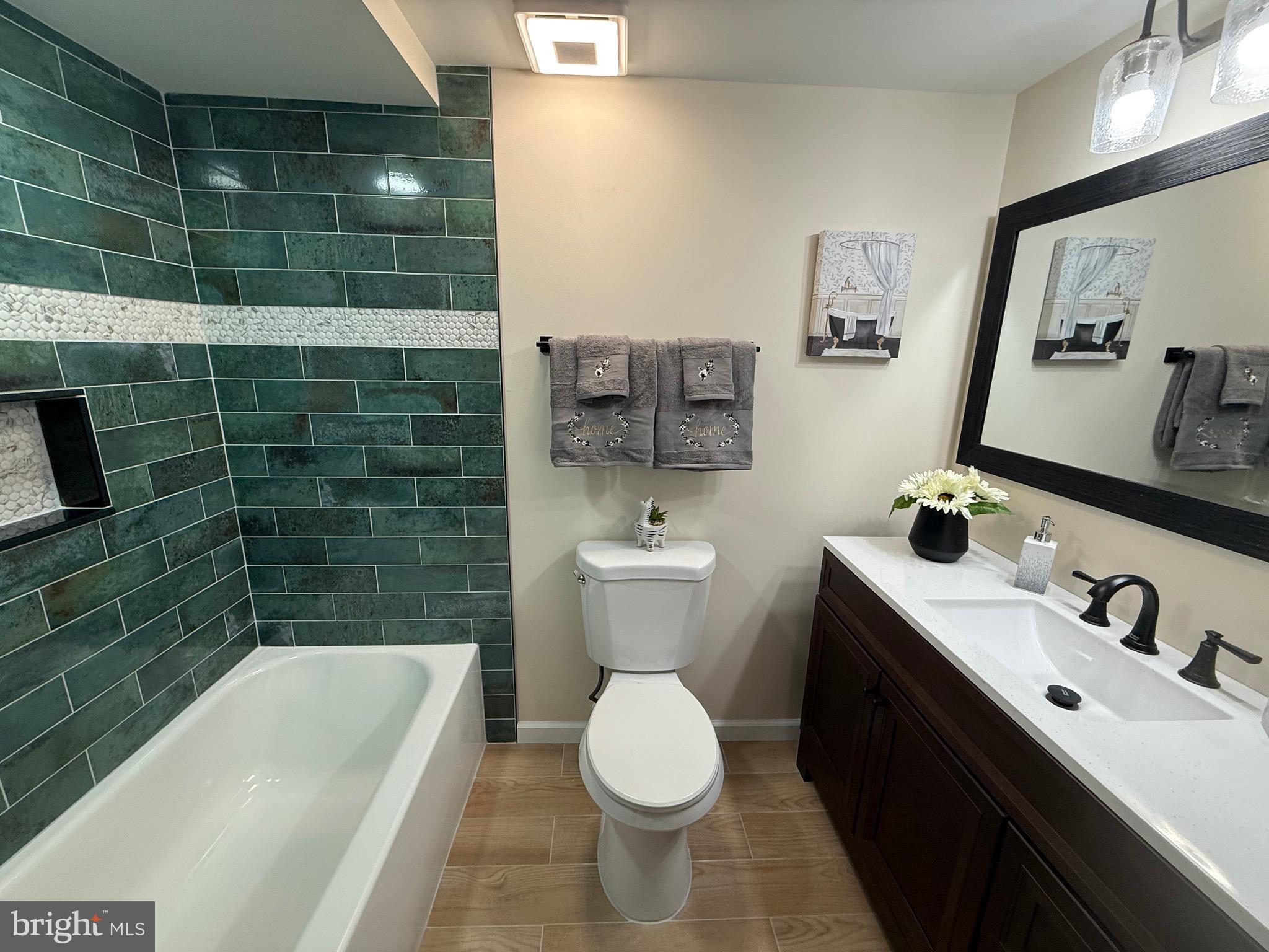 20121 Nanticoke Road Nanticoke, MD 21840 - Photo 48 of 88 a bathroom with a sink toilet and shower