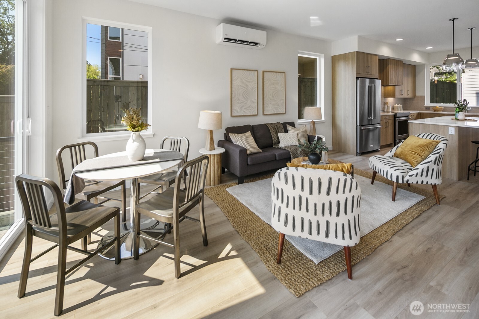 1748 Northwest 62nd Street Seattle, WA 98107 - Photo 11 of 33 a living room with furniture and a dining table with wooden floor