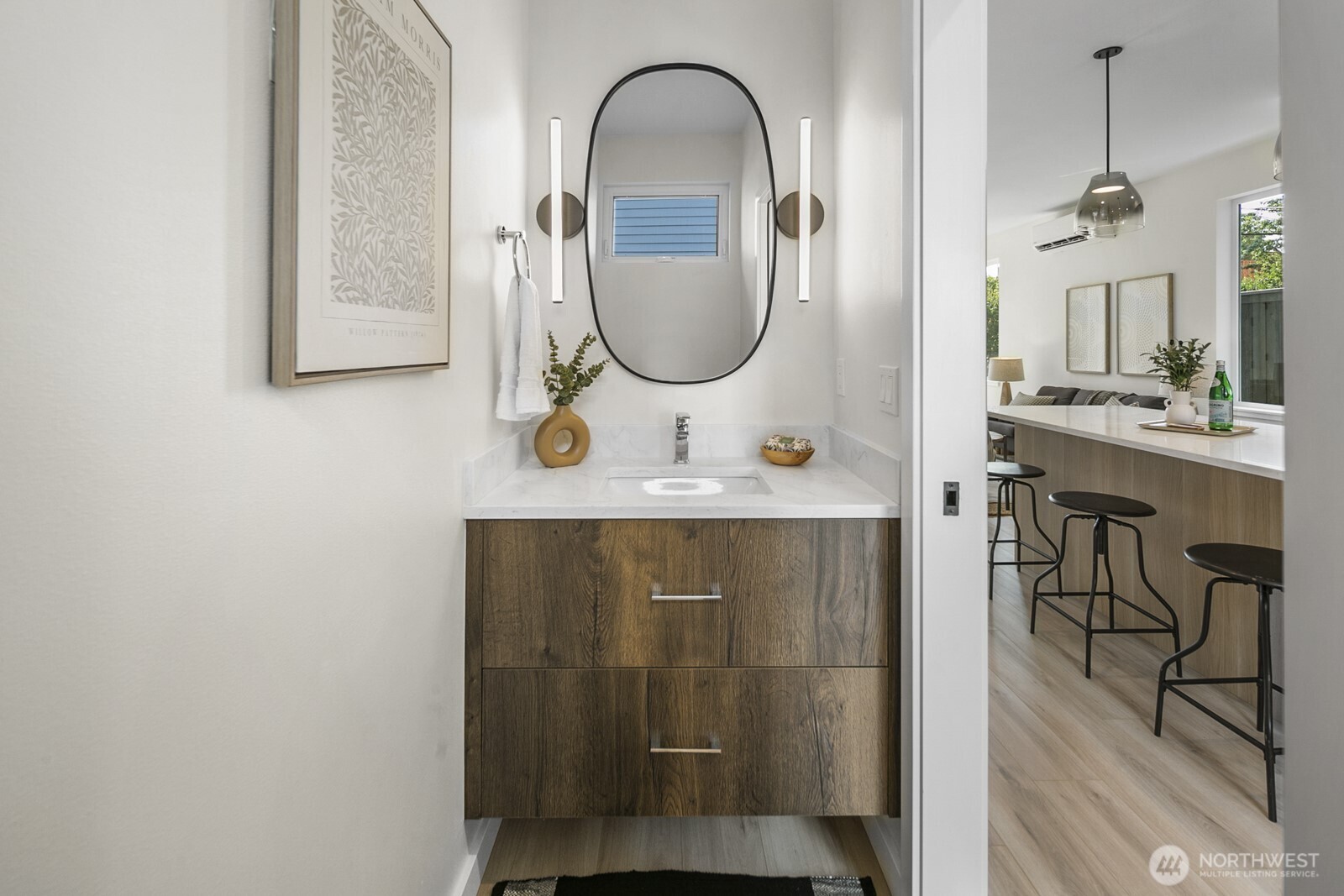 1748 Northwest 62nd Street Seattle, WA 98107 - Photo 14 of 33 a bathroom with a sink and a mirror