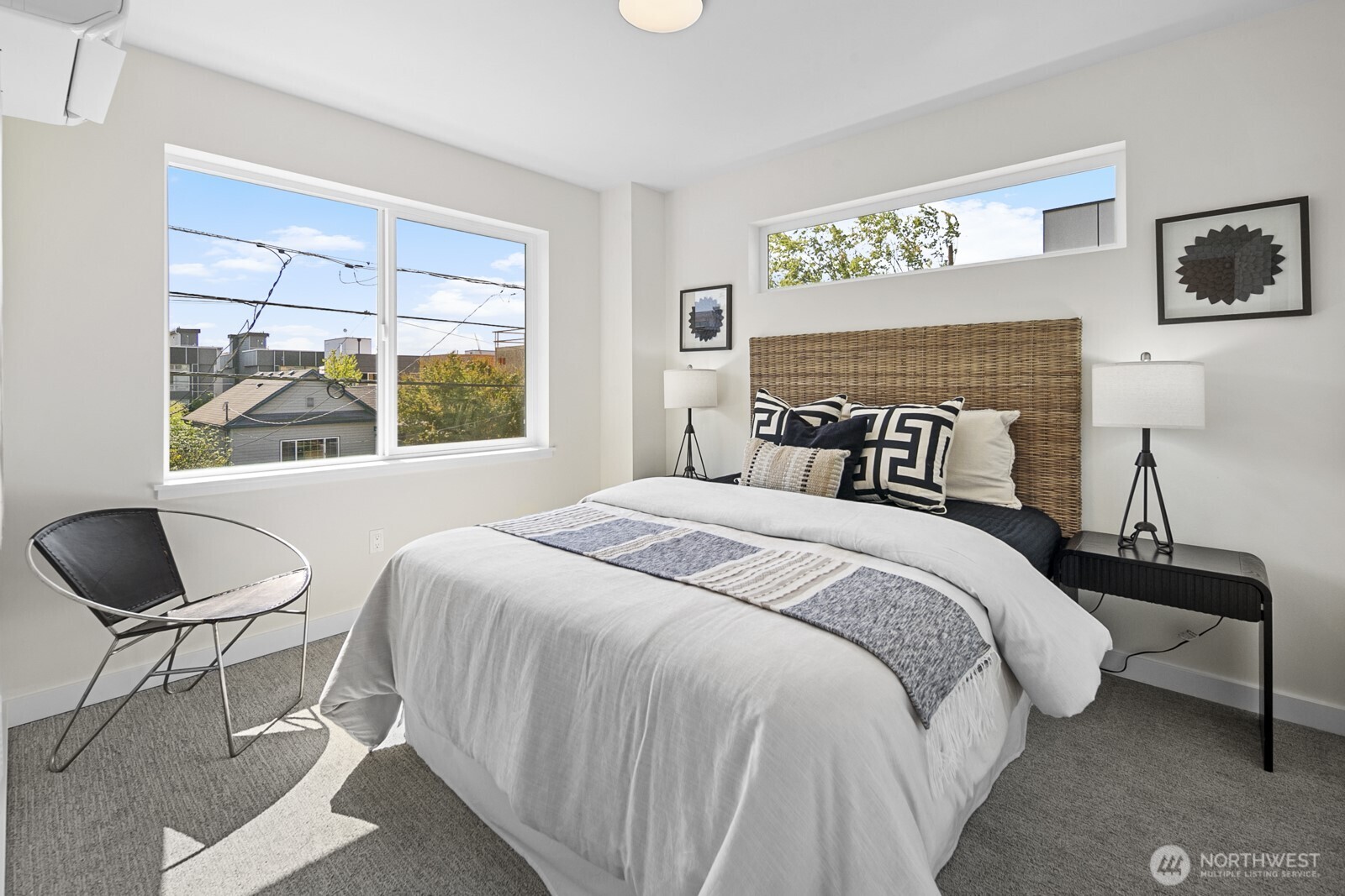 1748 Northwest 62nd Street Seattle, WA 98107 - Photo 19 of 33 a bedroom with a bed and a window