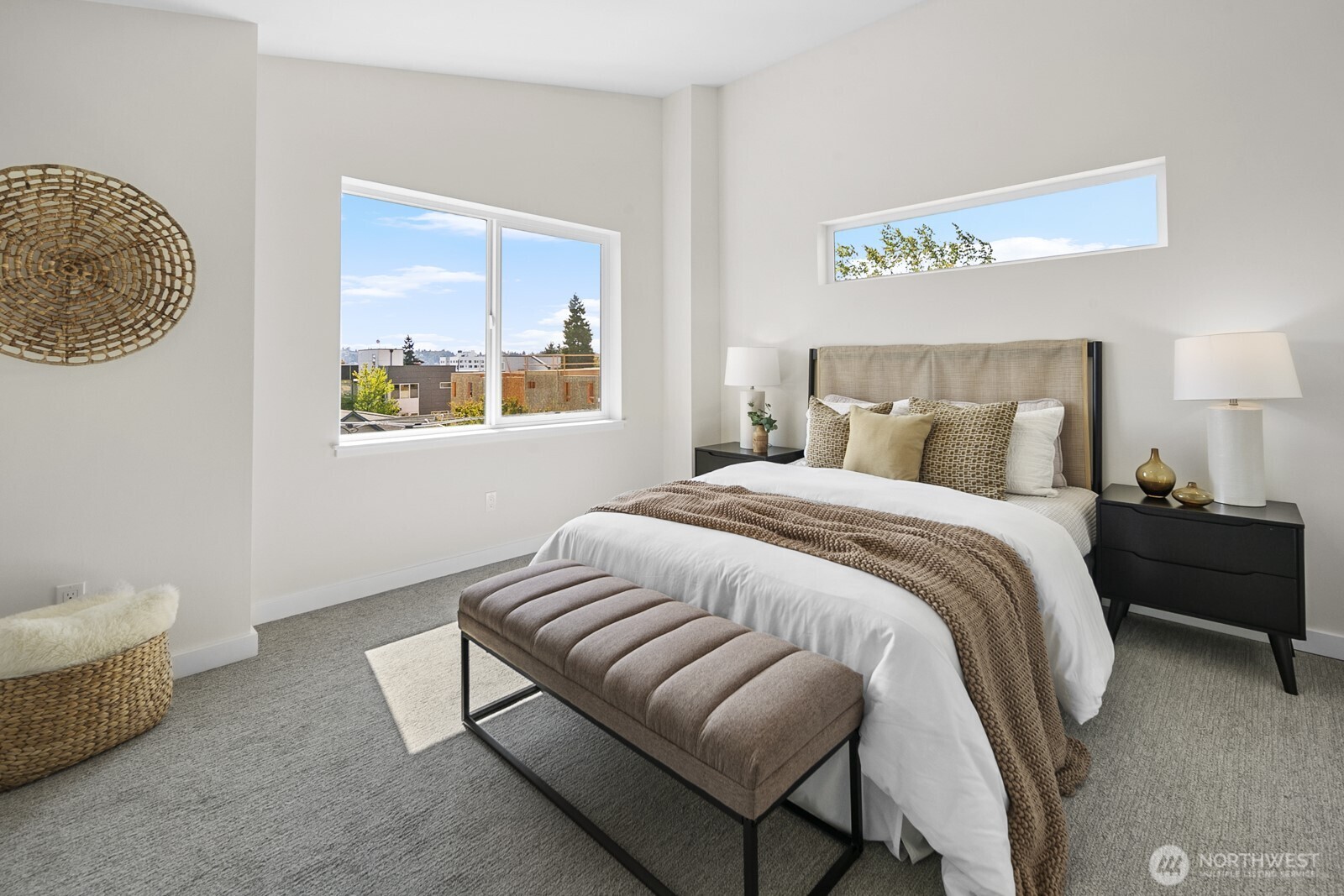 1748 Northwest 62nd Street Seattle, WA 98107 - Photo 23 of 33 a spacious bedroom with a bed and a window